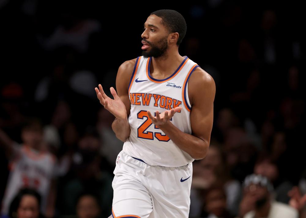 帮助球队重 帮助球队重